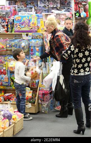 Gwen Stefani goes shopping with friends and her sons Kingston and Zuma at the Galleria Mall in Koreatown . They bought toys mainly and really enjoyed the company of koreans asking for autograph or picture with her in Los Angeles on December 11, 2011. Photo by GG/ABACAPRESS.COM Stock Photo