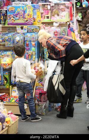 Gwen Stefani goes shopping with friends and her sons Kingston and Zuma at the Galleria Mall in Koreatown . They bought toys mainly and really enjoyed the company of koreans asking for autograph or picture with her in Los Angeles on December 11, 2011. Photo by GG/ABACAPRESS.COM Stock Photo