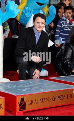 Anton Yelchin, The Smurfs, The Smurfs being honored with the Hand and Footprint Ceremony at Ceremony at Grauman's Chinese Theater in Hollywood, Ca, USA. December 14, 2011. Photo by Baxter/ABACAPRESS.COM Stock Photo