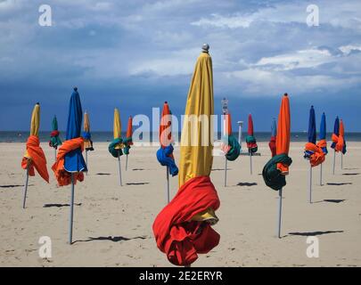 The famous colorful parasols on Deauville beach, Basse-Normandie, France, 2011. Les fameux parasols colores de la plage de Deauville, Basse-Normandie, France, 2011. Photo by David Lefranc/ABACAPRESS.COM Stock Photo