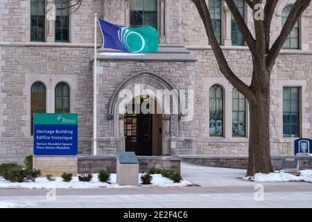 Ottawa, Ontario, Canada - January 8, 2021: The City of Ottawa Heritage Building's entrance from the Nelson Mandela Square on Elgin Street. Stock Photo