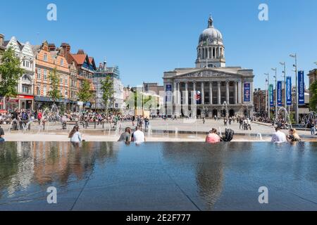 The imposing Nottingham Council House stands high above Nottingham's city centre acting as a backdrop to Nottingham's Old Market Square. Stock Photo