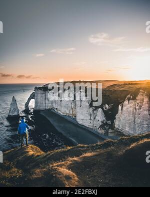 Etretat beach, with its famous chalk cliff, arch and needle in the ...
