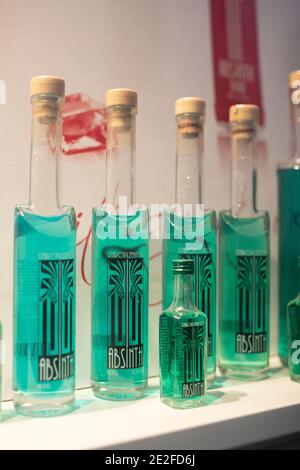 Bottles of absinthe for sale in the window of a shop in Prague, Czechia. Stock Photo