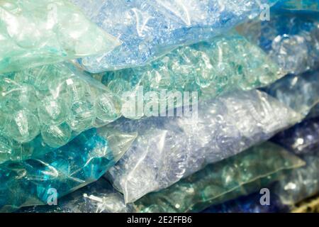 Stacks of blue crystals and pearls packages for bijou Stock Photo