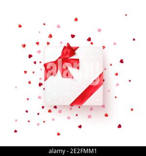 Square gift box with red silk ribbon and bow. Present for Valentine's day decorated confetti. Vector Stock Vector