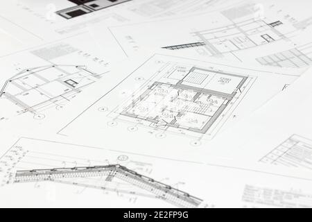 High angle view on architectural plans. Architectural design projects concept. Paper architectural drawings and blueprint Stock Photo