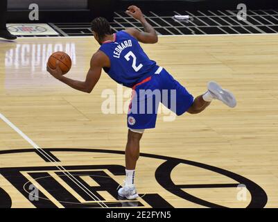 Los Angeles, United States. 13th Jan, 2021. Los Angeles Clippers' forward Kawhi Leonard prevents the turnover against the New Orleans during the fourth quarter at Staples Center in Los Angeles on Wednesday, January 13, 2021. The Clippers defeated the short-handed Pelicans 111-106. Photo by Jim Ruymen/UPI Credit: UPI/Alamy Live News Stock Photo