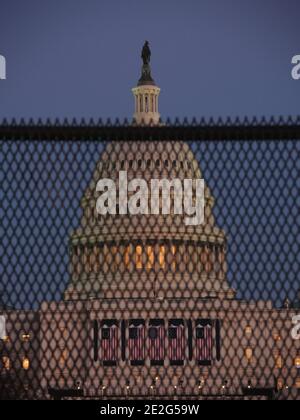 Washington, USA. 13th Jan, 2021. A House staffer walk with the lectern ...