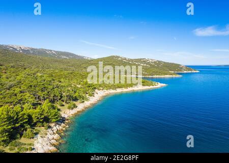 Amazing seascape on Adriatic sea, long shore of the island of Losinj in Croatia, aerial view from drone