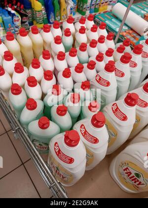 The counter in the supermarket with household chemicals. Dishwashing detergents Fairy: Mykolaiv, Ukraine - January 05, 2021. Stock Photo
