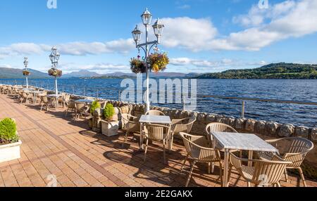 Looking out over loch Lomond from Duck Bay marina in Scotland on a sunny day with a blue sky Stock Photo