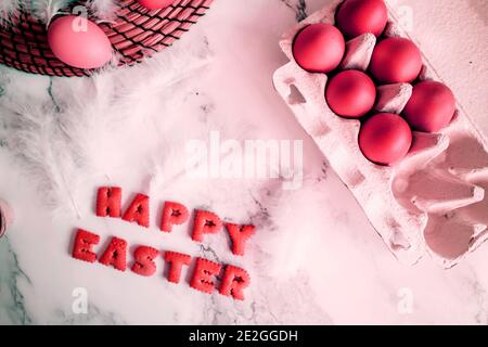 Easter holiday decorations, eggs on marble background. Stock Photo