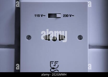 Power outlet plug for both US and European appliances. Close up. Stock Photo