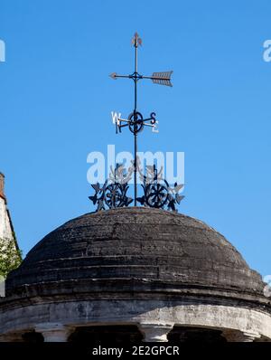 A wrought iron Victorian weather vane on the roof of the market cross in Tickhill, South Yorkshire Stock Photo