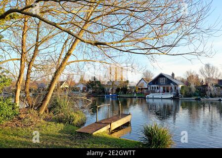 The riverside and River Thames at Shepperton on a cold sunny winters day, Surrey England UK Stock Photo