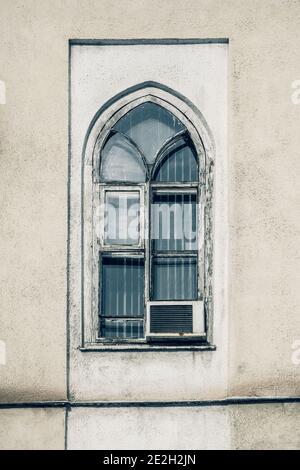 Air conditioner compressor installed in old building Stock Photo