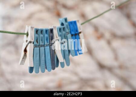 Clothespins on a rope. Stock Photo