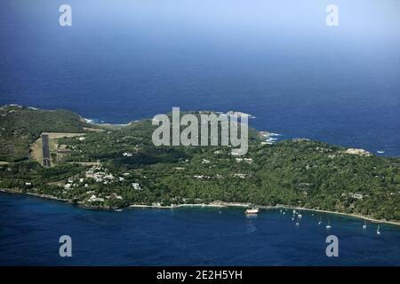 Caribbean, Saint Vincent and the Grenadines: aerial view of the private island of Mustique Stock Photo