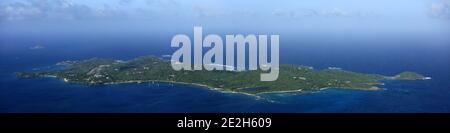 Caribbean, Saint Vincent and the Grenadines: aerial view of the private island of Mustique Stock Photo