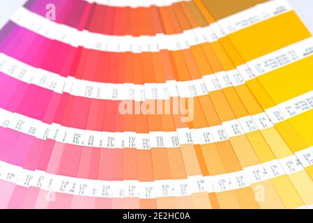Paper color palette, palette guide as yellow, orange, pink, red color,  top view Stock Photo