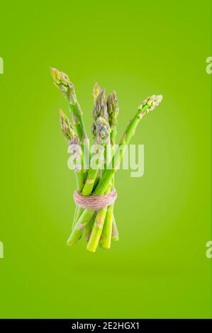Creative idea layout with fresh vegetables on colored background Stock Photo