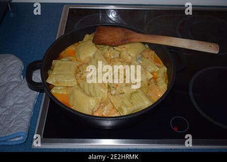 Maultaschen with fennel and cheese sauce Stock Photo