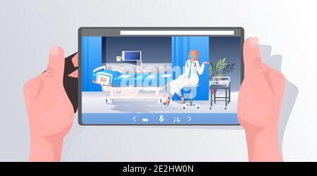 doctor in mask and protective suit sitting near hospital bed on tablet screen covid-19 pandemic fight against coronavirus concept clinic ward interior horizontal full length vector illustration Stock Vector