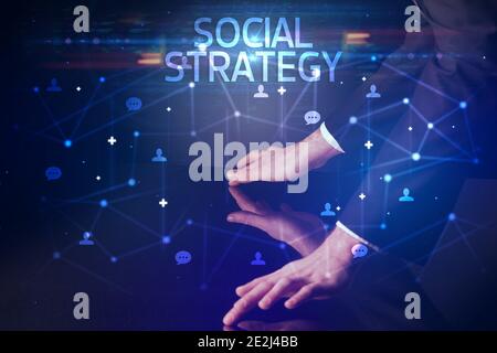 Navigating social networking with SOCIAL STRATEGY inscription, new media concept Stock Photo