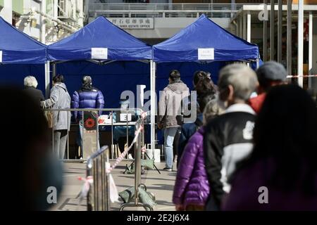 Hong Kong, China. 13th Jan, 2021. All the residents in Ping Shek Estate have to take the nucleic acid testing as the COVID-19 virus is found in their sanitary sewage in Hong Kong, China on January 13, 2021. (Photo by Top Photo/Sipa USA) Credit: Sipa USA/Alamy Live News Stock Photo