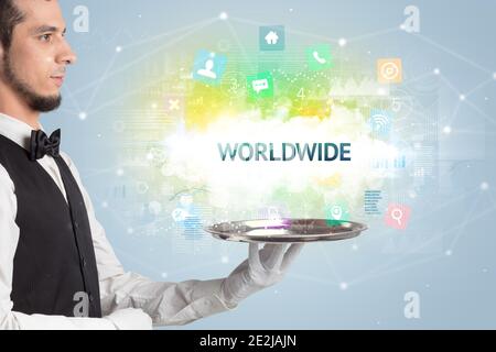 Waiter serving social networking concept with WORLDWIDE inscription Stock Photo
