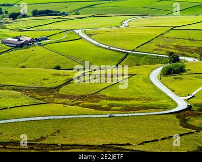 View looking down on the winding A537 road which runs between Buxton and Macclesfield on the Derbyshire and Cheshire border Peak District England UK Stock Photo