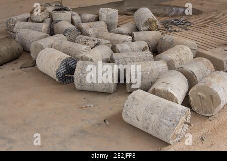 Concrete cores close-up. The result of the concrete core drilling process. Drilling in concrete. Industrial concrete drilling Stock Photo