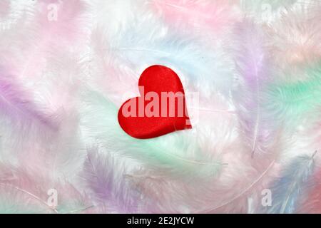 Flying red hearts on white background. Valentine's Day. Symbol of love. Copy space. Stock Photo