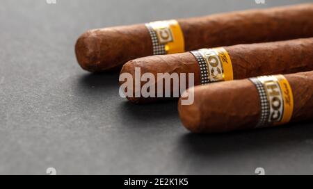 Athens Greece, December 30, 2020. Cohiba Cigars. Cuban premium quality robustos on black background, closeup view Stock Photo