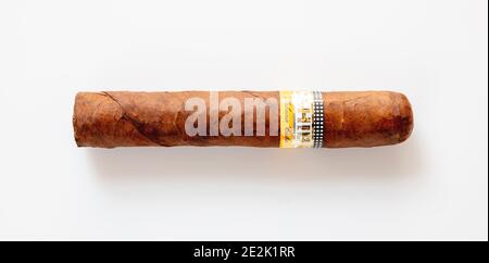 Athens Greece, December 30, 2020. Cohiba Cigar. Cuban premium quality brand robusto isolated on white background, closeup top view Stock Photo