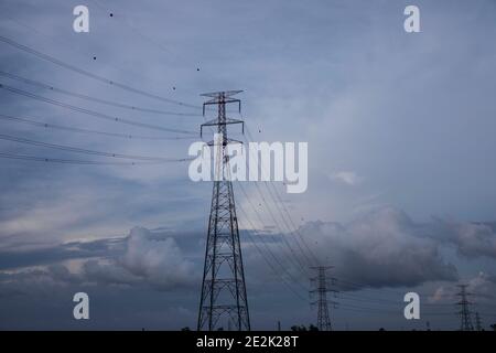 National grid electricity pylons on the Buriganga River at Narayanganj, Bangladesh Stock Photo