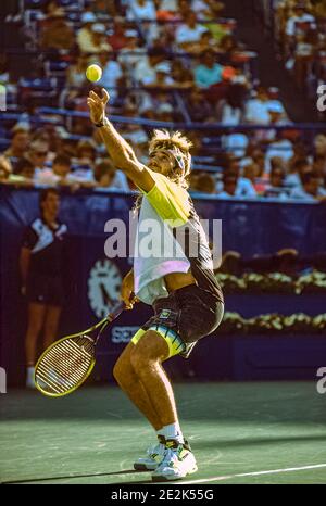 Andre Agassi (USA) competing at the 1990 US Open Tennis