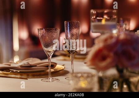 https://l450v.alamy.com/450v/2e2ka0b/champagne-and-wine-glasses-on-the-blurred-background-place-for-your-text-table-setting-in-the-restaurant-2e2ka0b.jpg