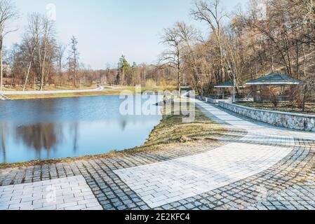 Fragment of the Feofaniya park in Kiev. Nice picturesque lake and well-groomed landscape. Stock Photo