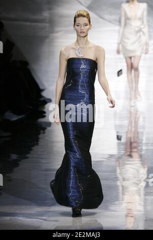 A model displays a creation by Giorgio Armani for Giorgio Armani