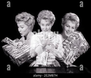 1950s 1960s TRIPLE EXPOSURE BLONDE WOMAN LOOKING AT CAMERA HOLDING GIFT WRAPPED PRESENT WITH BIG BOW & BEST WISHES GREETING TAG - g4759 DEB001 HARS TEAMWORK BEST EXPOSURE ABSTRACT JOY LIFESTYLE SATISFACTION CELEBRATION FEMALES STUDIO SHOT EVENT HOME LIFE COPY SPACE HALF-LENGTH LADIES PERSONS CARING SYMBOLS PACKAGE MIDDLE-AGED B&W EYE CONTACT TEMPTATION HAPPINESS HEAD AND SHOULDERS STRATEGY AND CHOICE EXCITEMENT RECREATION SPECIAL OCCASION TRIPLE CONCEPT CONCEPTUAL ANNIVERSARY STYLISH DEB001 SYMBOLIC CONCEPTS MID-ADULT RELAXATION SPECIAL EFFECT BLACK AND WHITE CAUCASIAN ETHNICITY GRAPHIC EFFECT Stock Photo