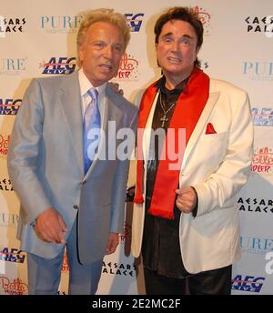 LAS VEGAS - FEBRUARY 20,2008: Siegfried Fischbacher and Roy Horn arrive at the Grand Opening of Bette Midler's 'The Showgirl Must Go On' at Caesars Palace February 20, 2008 - Caesars Palace Las Vegas, NV United States  People:  Siegfried Fischbacher, Roy Horn Credit: hoo-me / MediaPunch Stock Photo