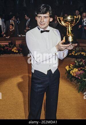 LONDON - ENGLAND 22/29 JAN 84. Jimmy White receives the winners trophy at the Benson & Hedges Masters snooker tournament at the Wembley Conference Cen Stock Photo