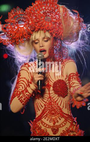 Actress and singer Arielle Dombasle performs during Jean-Paul Gaultier