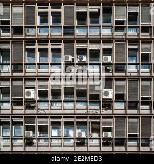 Modern structure of an exterior wall of an office building in Athens, Greece Stock Photo