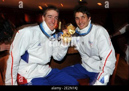 France's Vincent Jay and Jason Lamy Chappuis celebrate with their gold medals at the club France during the Vancouver 2010 XXI Olympic Winter Games in Whistler, Canada on February 14, 2010. Photo by Gouhier-Hahn-Nebinger/ABACAPRESS.COM Stock Photo