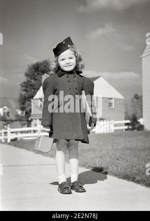 1940s PORTRAIT CUTE SMILING LITTLE GIRL WITH BRAID IN HER HAIR MAKING ...