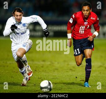 Lille's Pierre-Emerick Aubameyang fights for the ball with Auxerre's Cedric Hengbart during French First League soccer match, Lille vs AJ Auxerre at Stadium Lille Metropole in Lille, France on Febuary 28, 2010. Auxerre won 2-1. Photo by Mikael LIbert/ABACAPRESS.COM Stock Photo