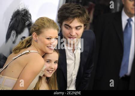 Actor Robert Pattinson, Ruby Jerins and Emilie de Ravin attend the premiere of 'Remember Me' at the Paris Theatre in New York City, NY, USA on March 1, 2010. Photo by Mehdi Taamallah/ABACAPRESS.COM (Pictured: Ruby Jerins, Robert Pattinson, Emilie de Ravin) Stock Photo